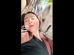 Quick TikTok video of girl and dog