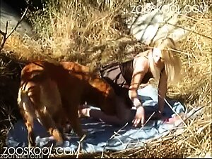 Pretty-looking blonde in a skirt blows a dog